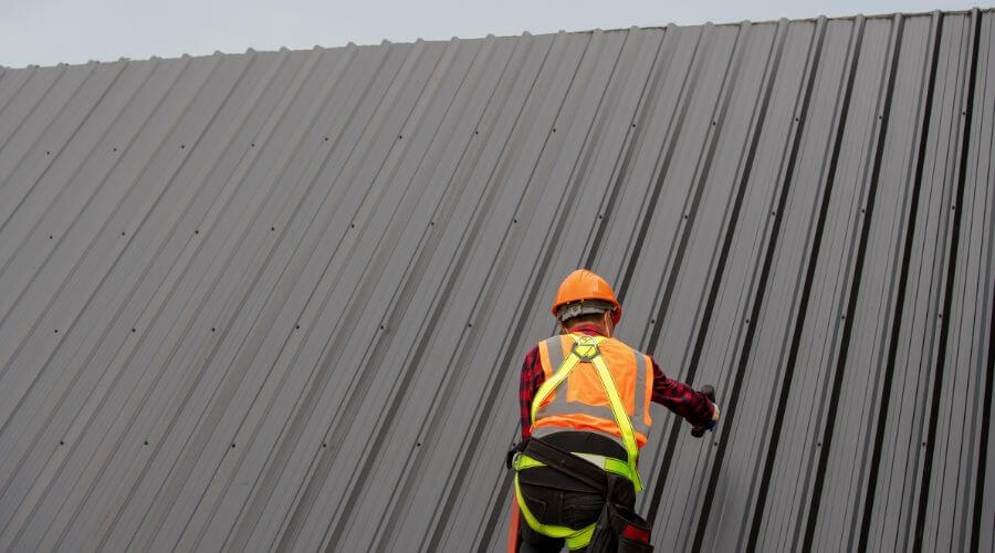 Professional metal roof installation services in Climbing Hill, IA